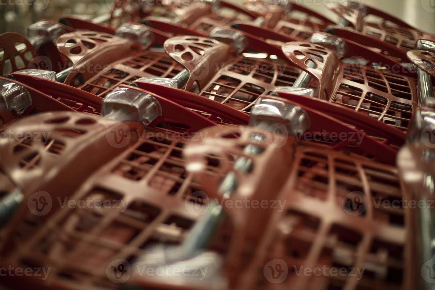 Supermarket details. Red plastic containers. photo