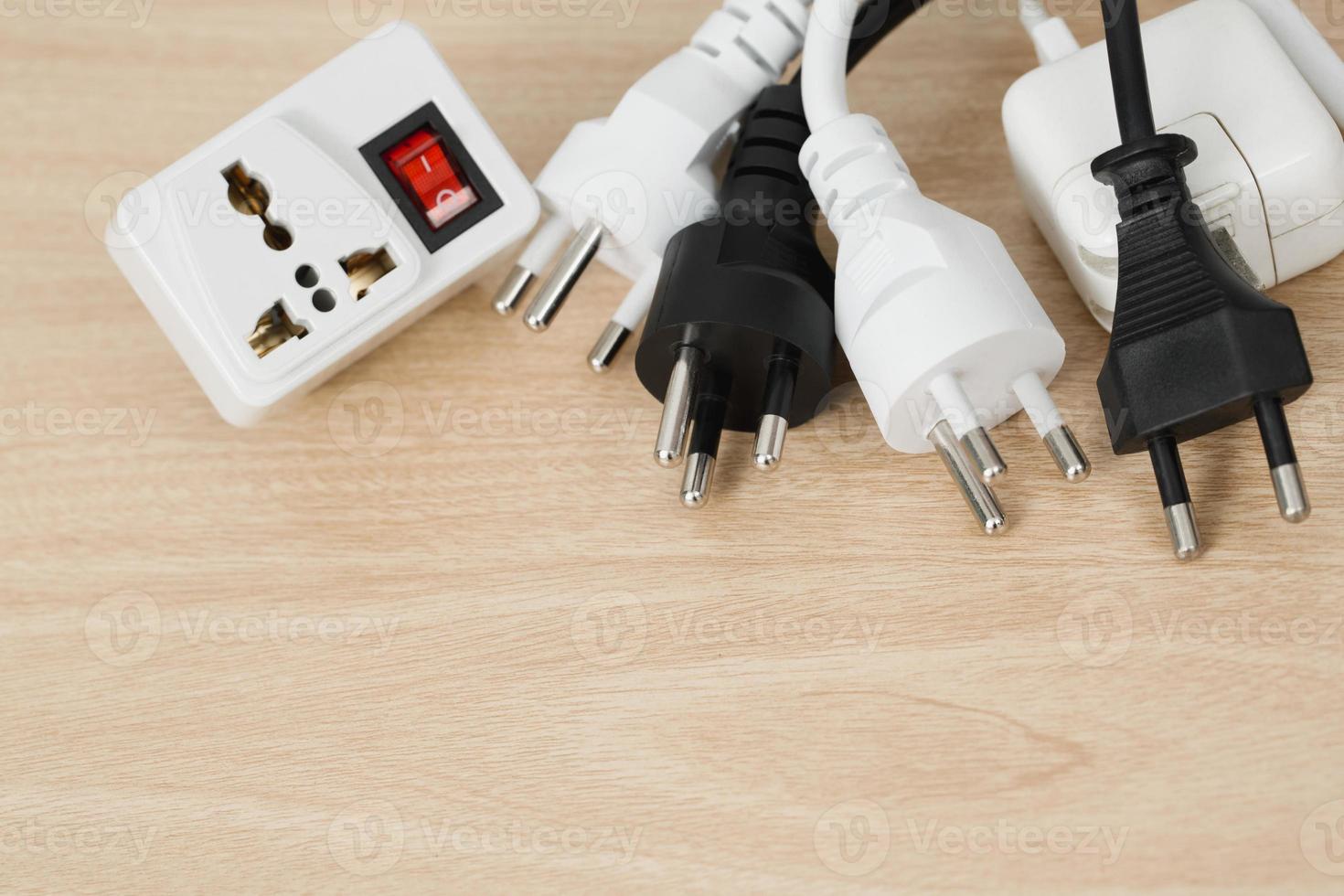 Electrical appliances plugs full of all plugs or plugs together. Because of the risk of causing a short circuit from high heat accumulated in the wires. photo