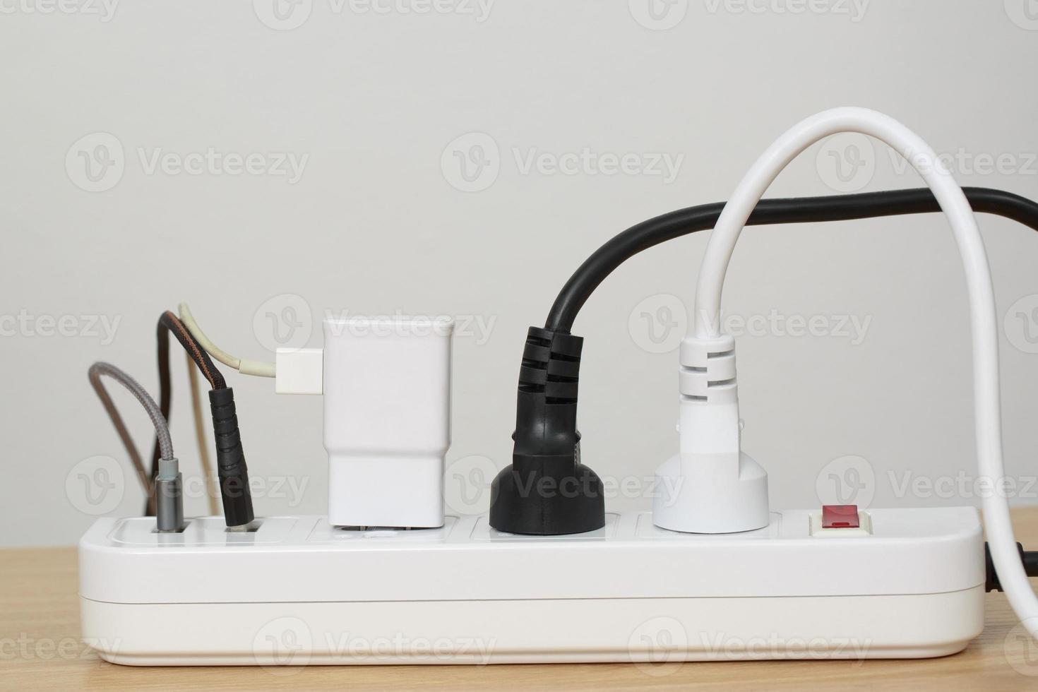 Electrical appliances plugs full of all plugs or plugs together. Because of the risk of causing a short circuit from high heat accumulated in the wires. photo