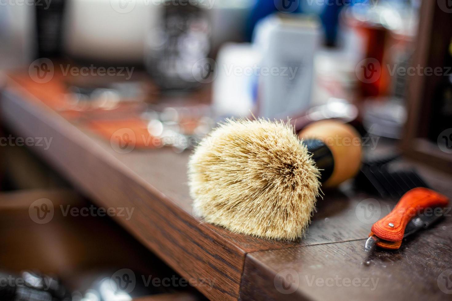 Shaving accessories for man on table against dark background photo