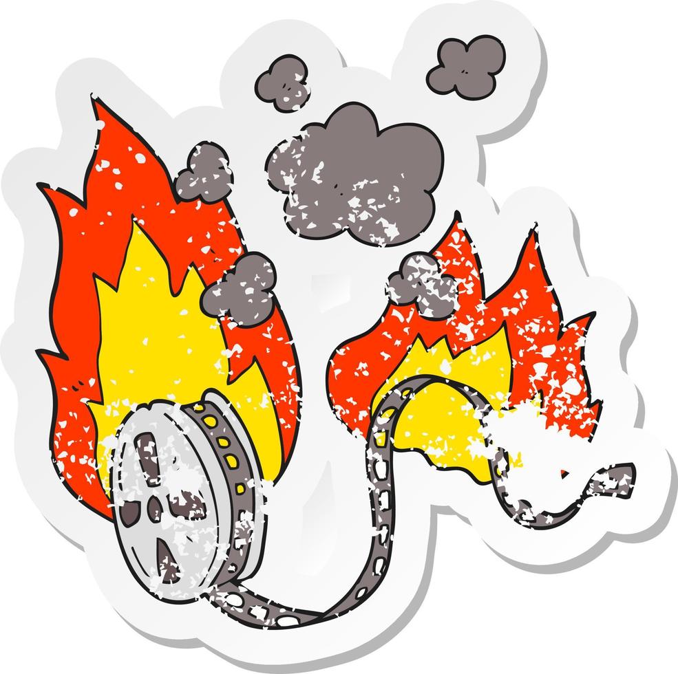 retro distressed sticker of a cartoon movie film burning vector