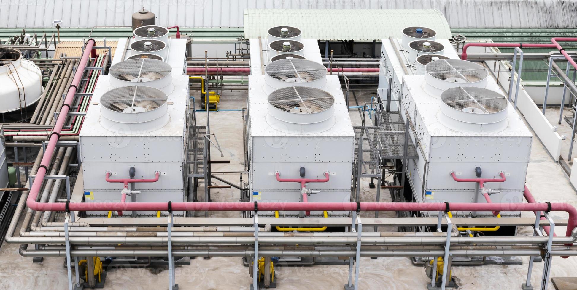 Cooling water tower on rooftop industry plant photo