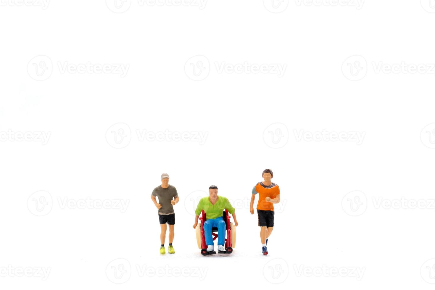 Miniature people Disabled happy friends having fun together photo