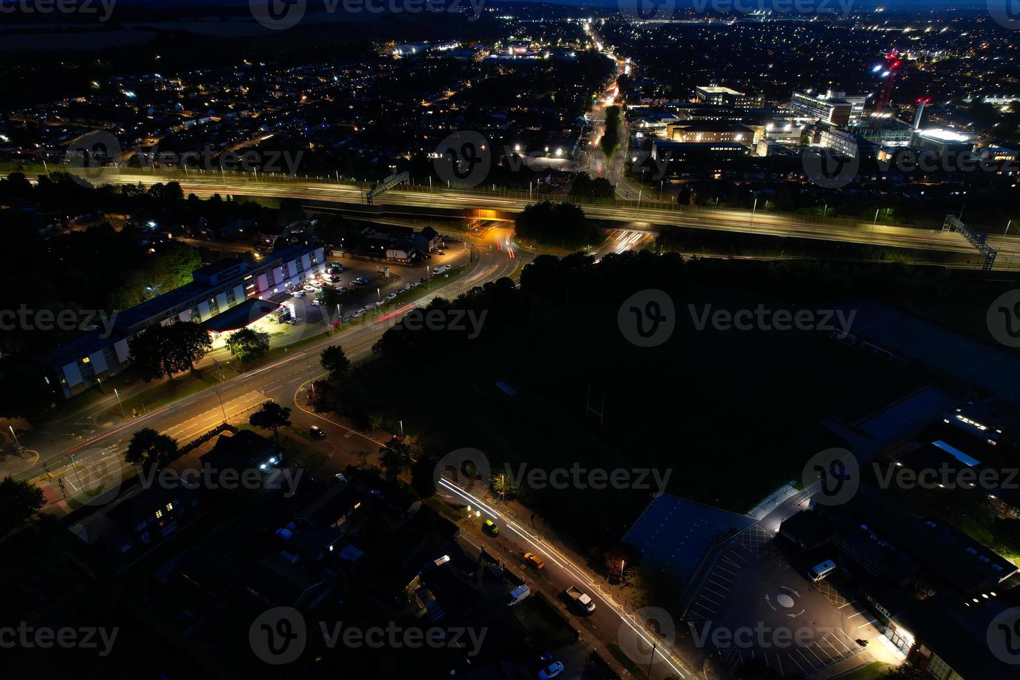 High Angle View of British Motorways with Traffic. The Aerial footage of British Roads and Motorways at between M1 Junction 7 and 9 at Sunset. The Footage captured on 09-07-2022 with drone's camera photo