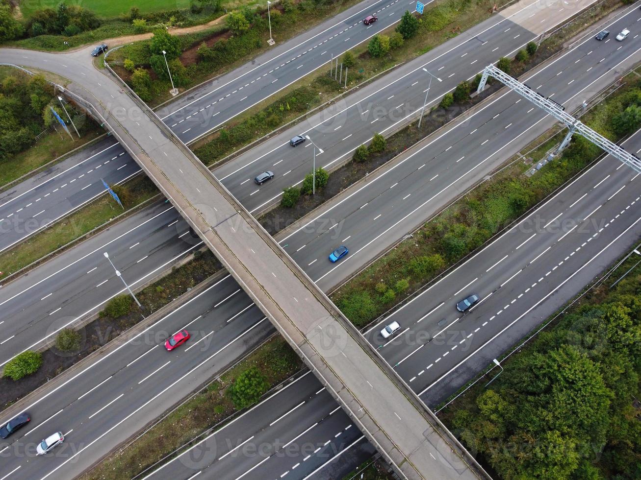 High Angle View of British Motorways with Traffic. The Aerial footage of British Roads and Motorways at between M1 Junction 7 and 9 at Sunset. The Footage captured on 09-07-2022 with drone's camera photo