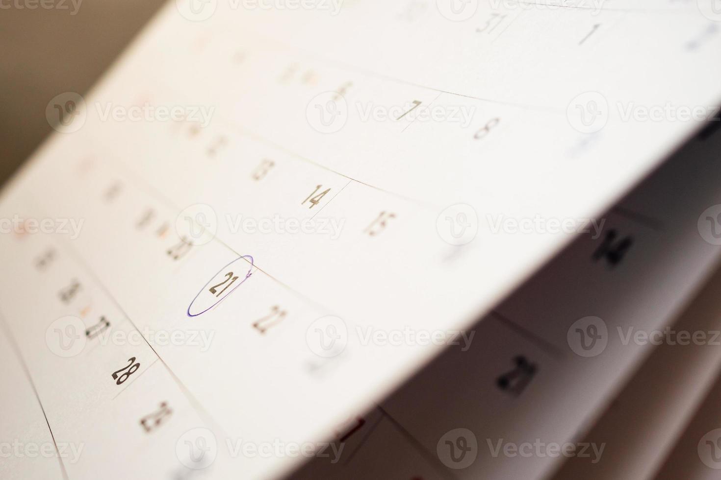 Abstract blur calendar page flipping sheet close up background photo