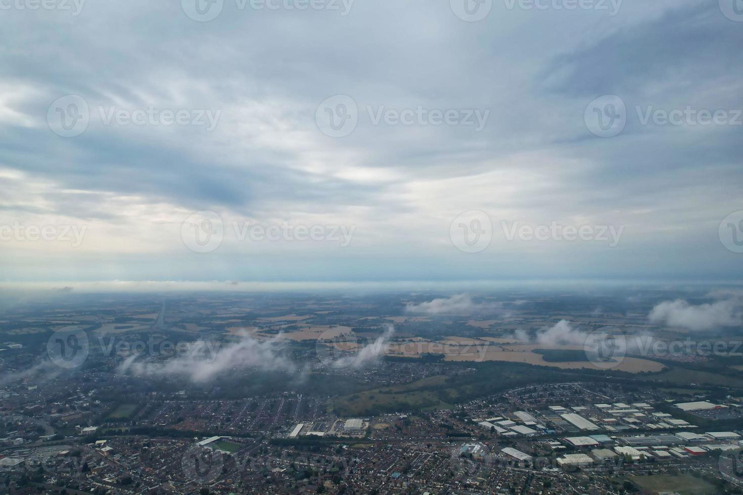 Gorgeous Aerial view of Dramatic Clouds over City photo