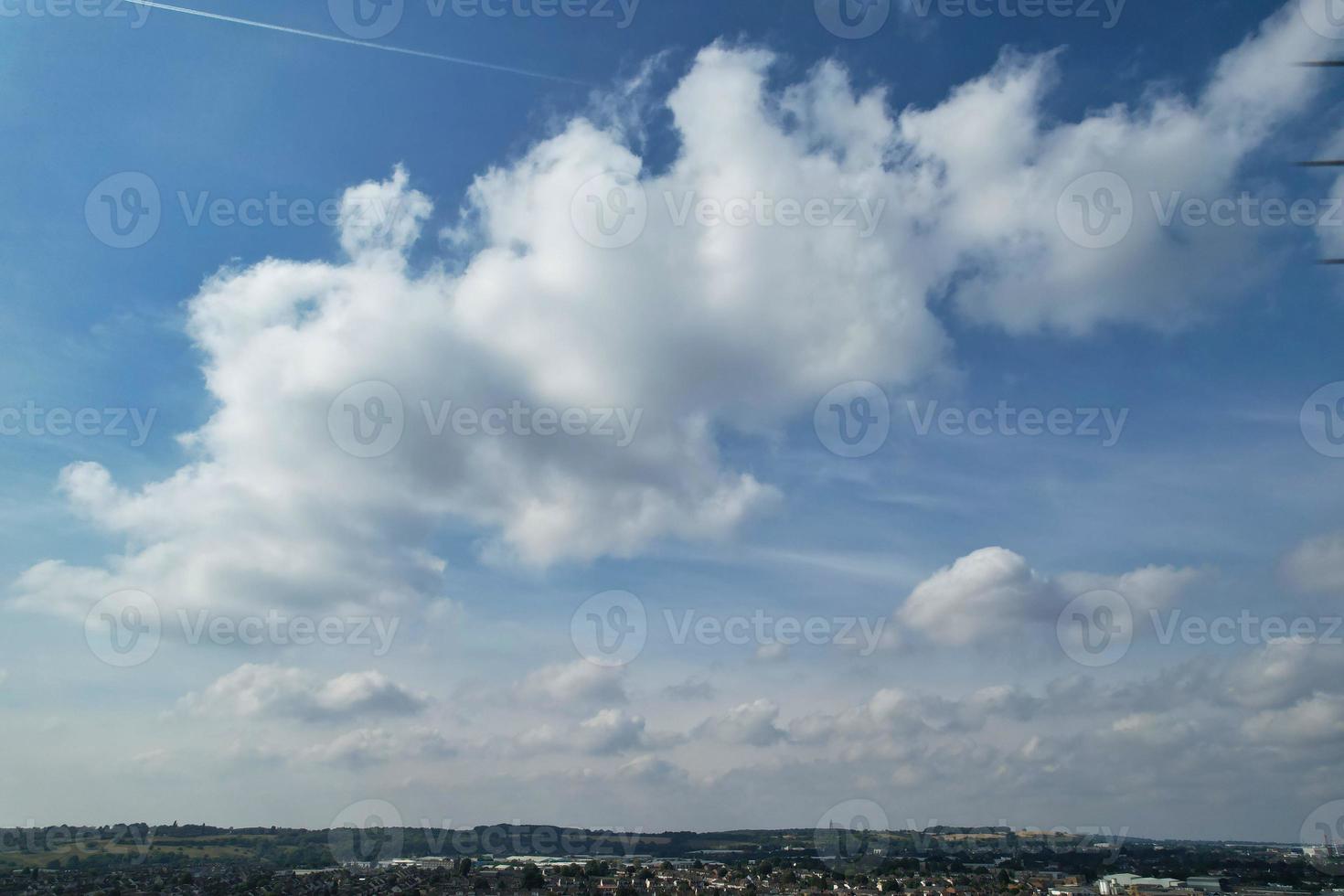 Beautiful and Dramatic Clouds over British City photo