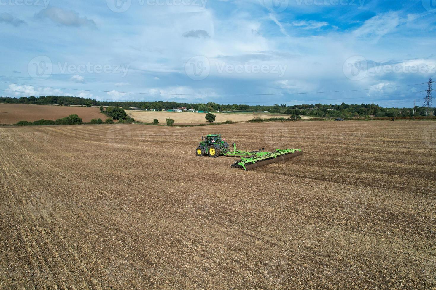 High angle view of cows grazing on field photo