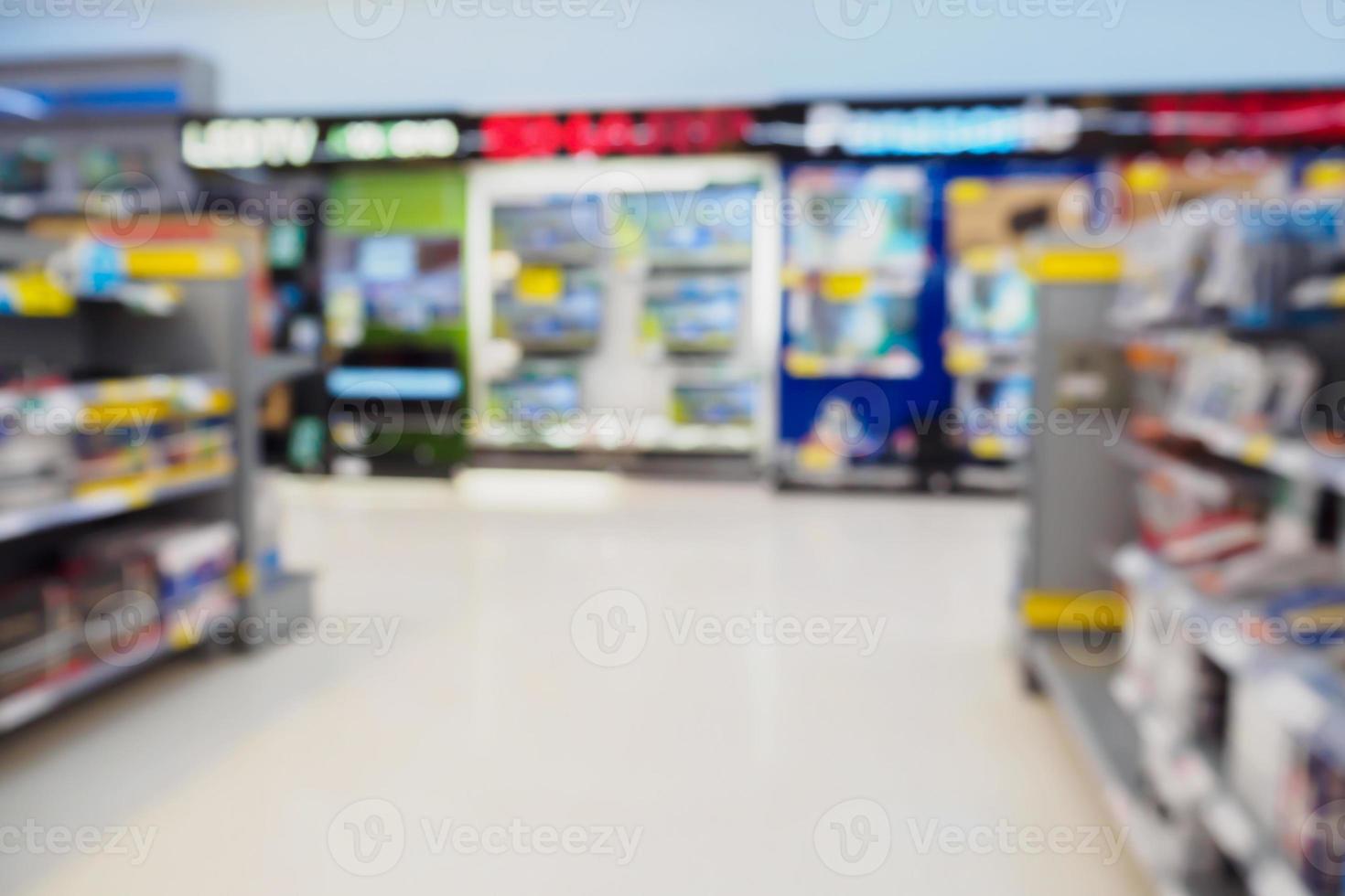 blur eletronic department store with bokeh background photo