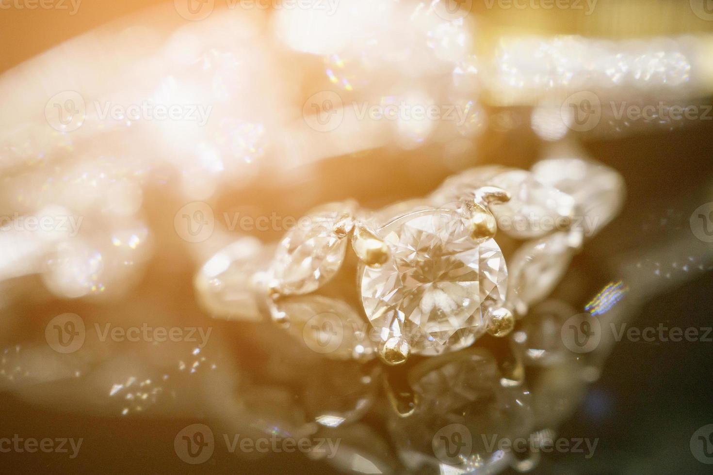 Luxury Jewelry diamond rings with reflection on black background photo