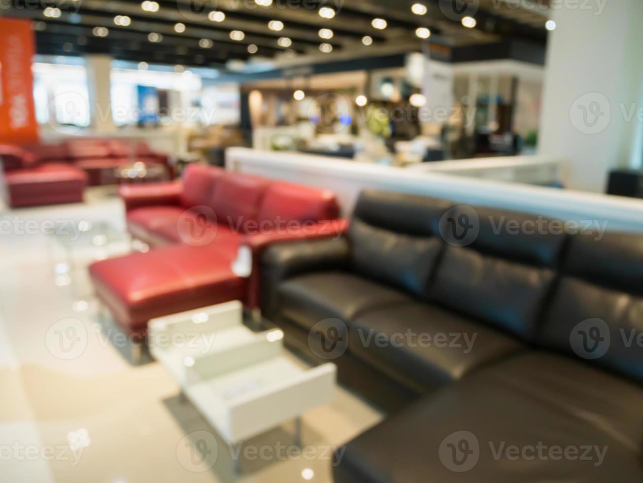 Abstract blur sofa in furniture store shop interior background for