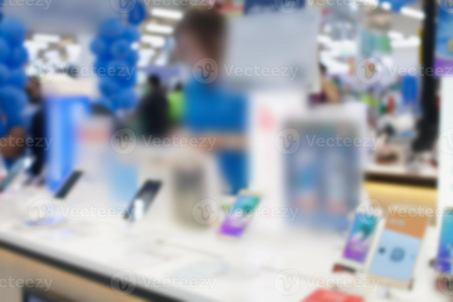 mobile phone in shop blurred background photo