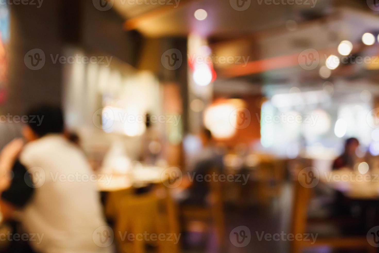 Restaurant cafe or coffee shop interior with people abstract blur background photo