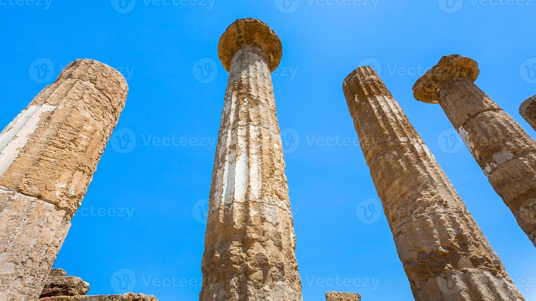 blue sky and Dorian columns of ancient Temple photo
