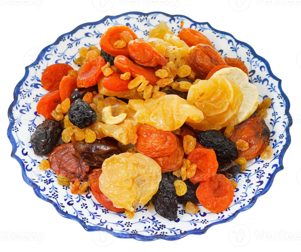 dried sweet fruits on turkish plate photo