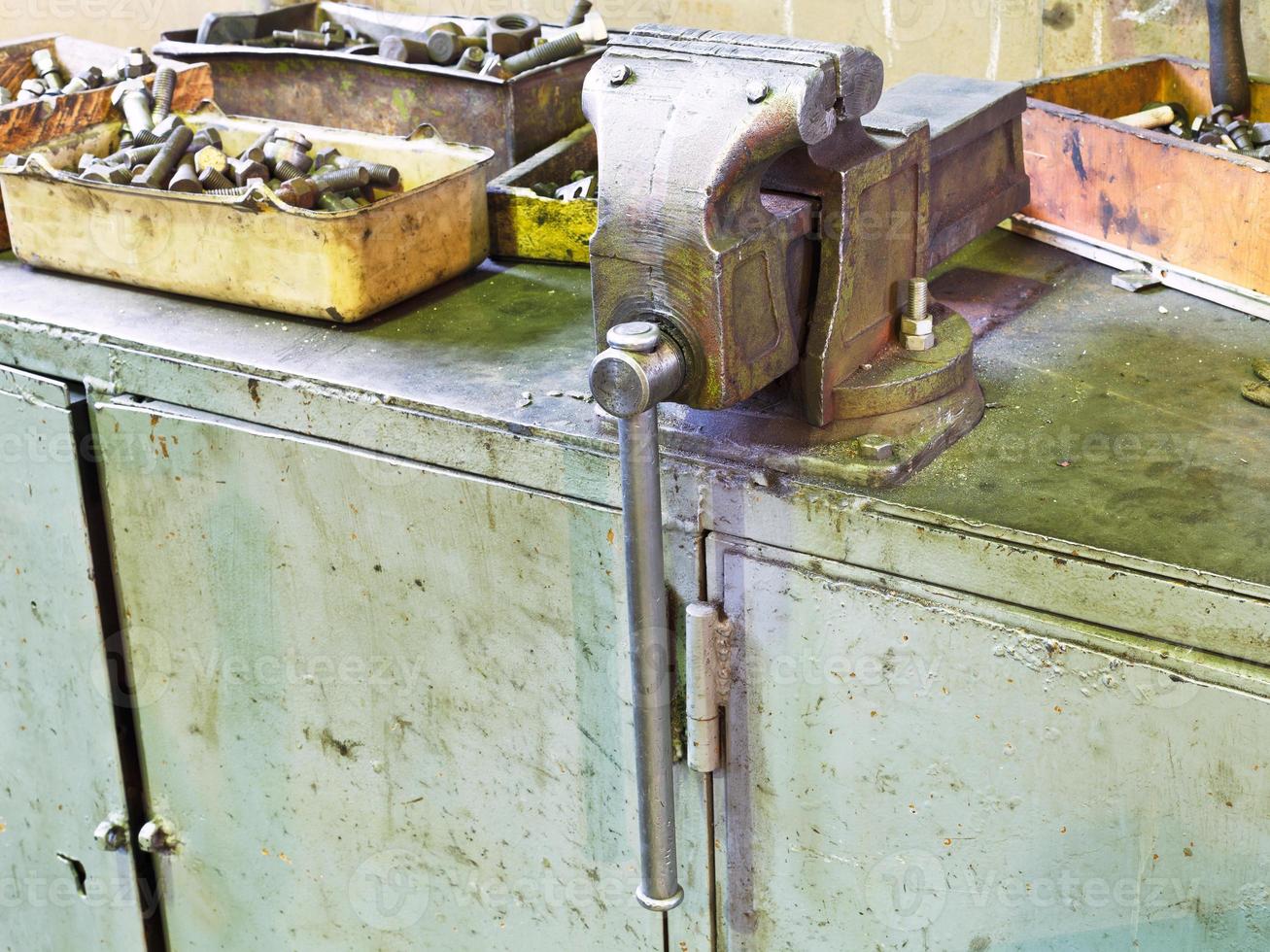 vice and details on workbench photo