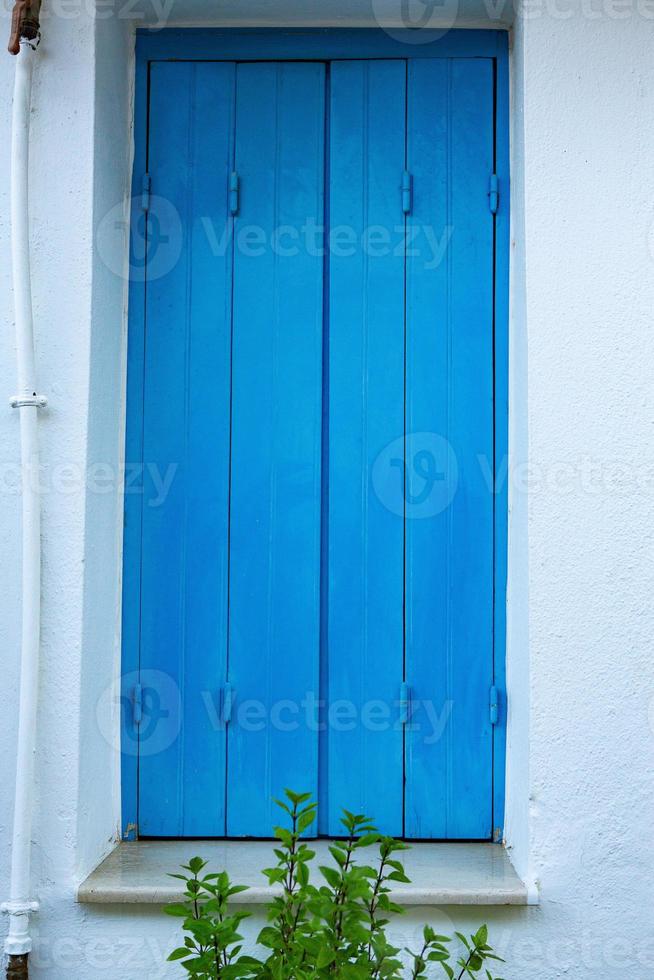 Narrow and colorful street in the village of Kritsa in the island of Crete photo