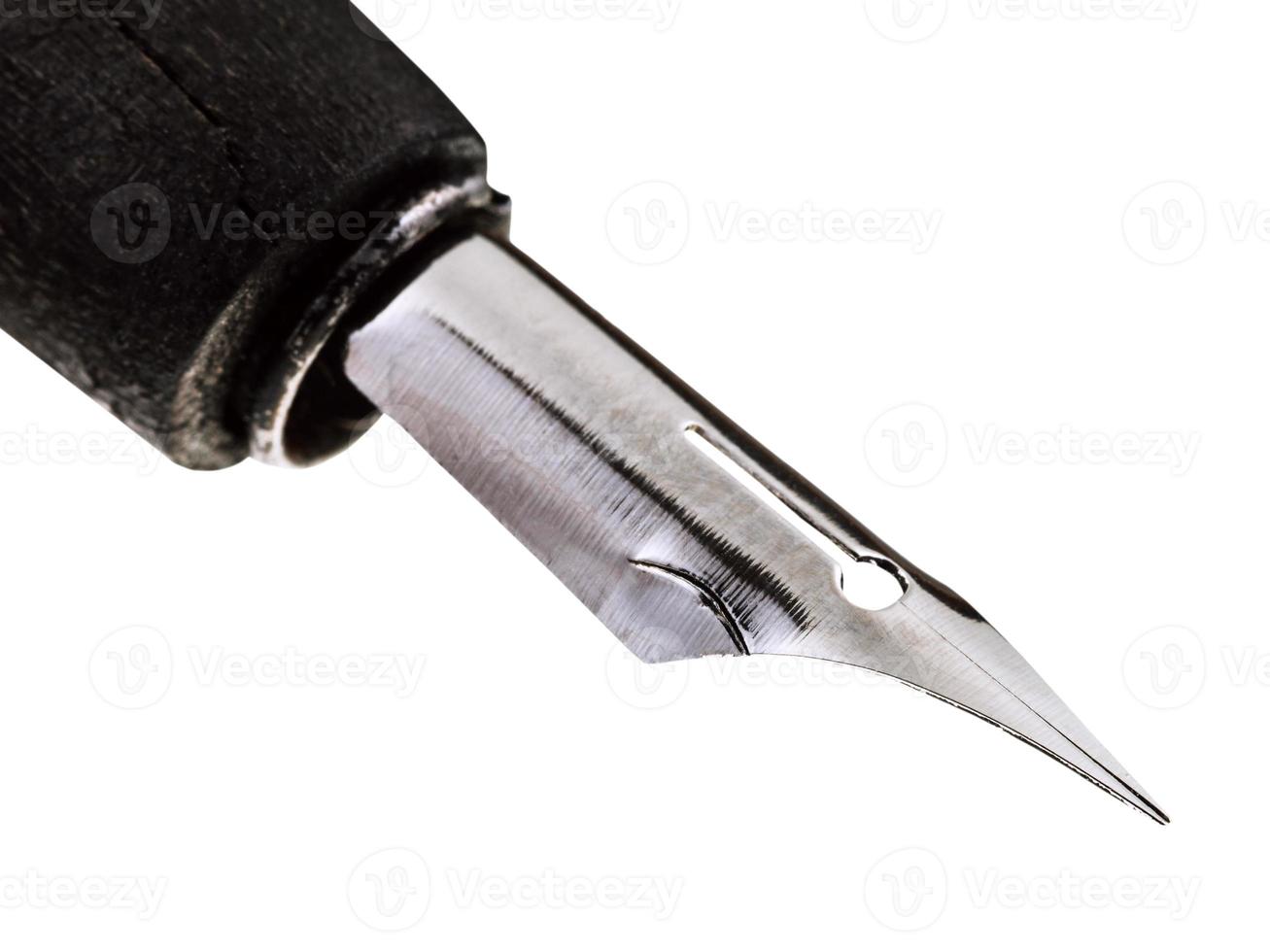 steel sharp nib of drawing pen close up photo