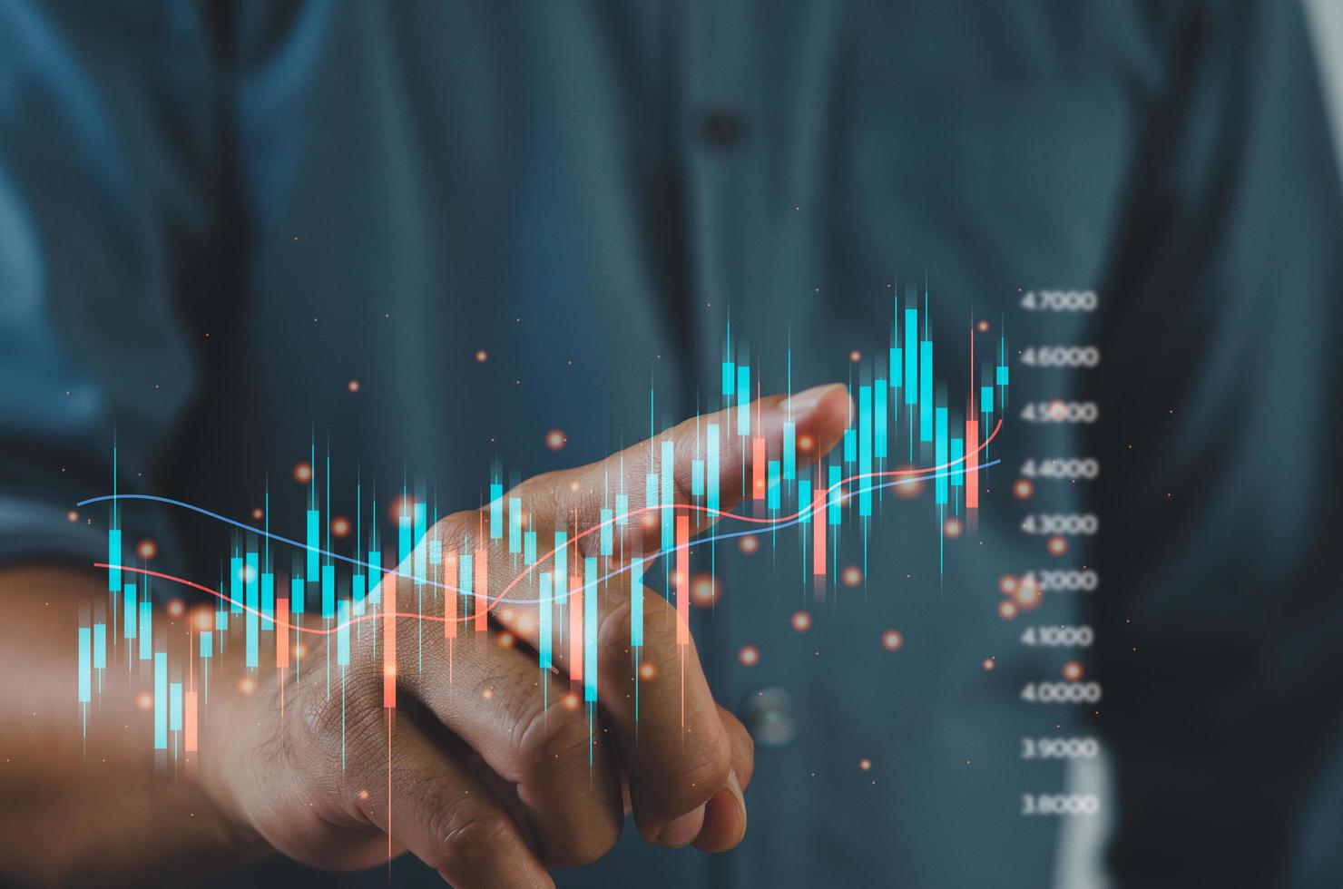Finance and business investment concept. Stock and crypto investment funds.Businessman analyzing or trading Forex graphs of financial data candlestick chart. photo