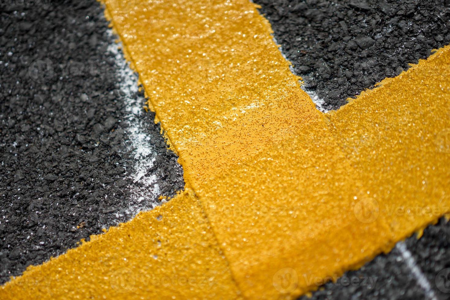 Close up fresh Thermoplastic on the asphalt road photo