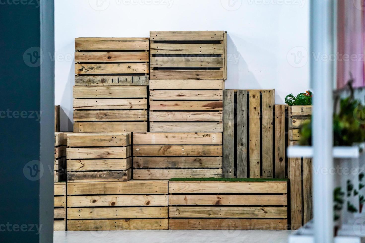 wood box chair in the row and the arrangement nearby wall, ready to pick up to use photo