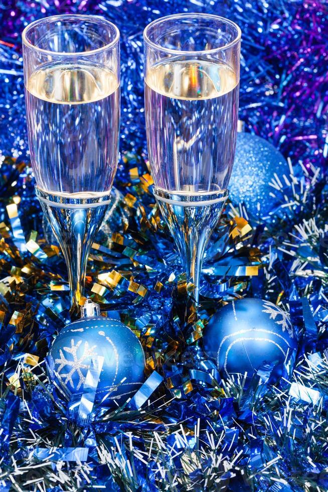 above view of glasses in blue Xmas decorations photo