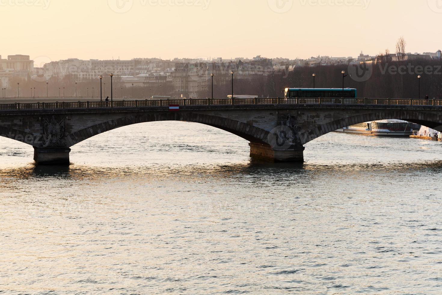 bridge in Paris on sunset photo
