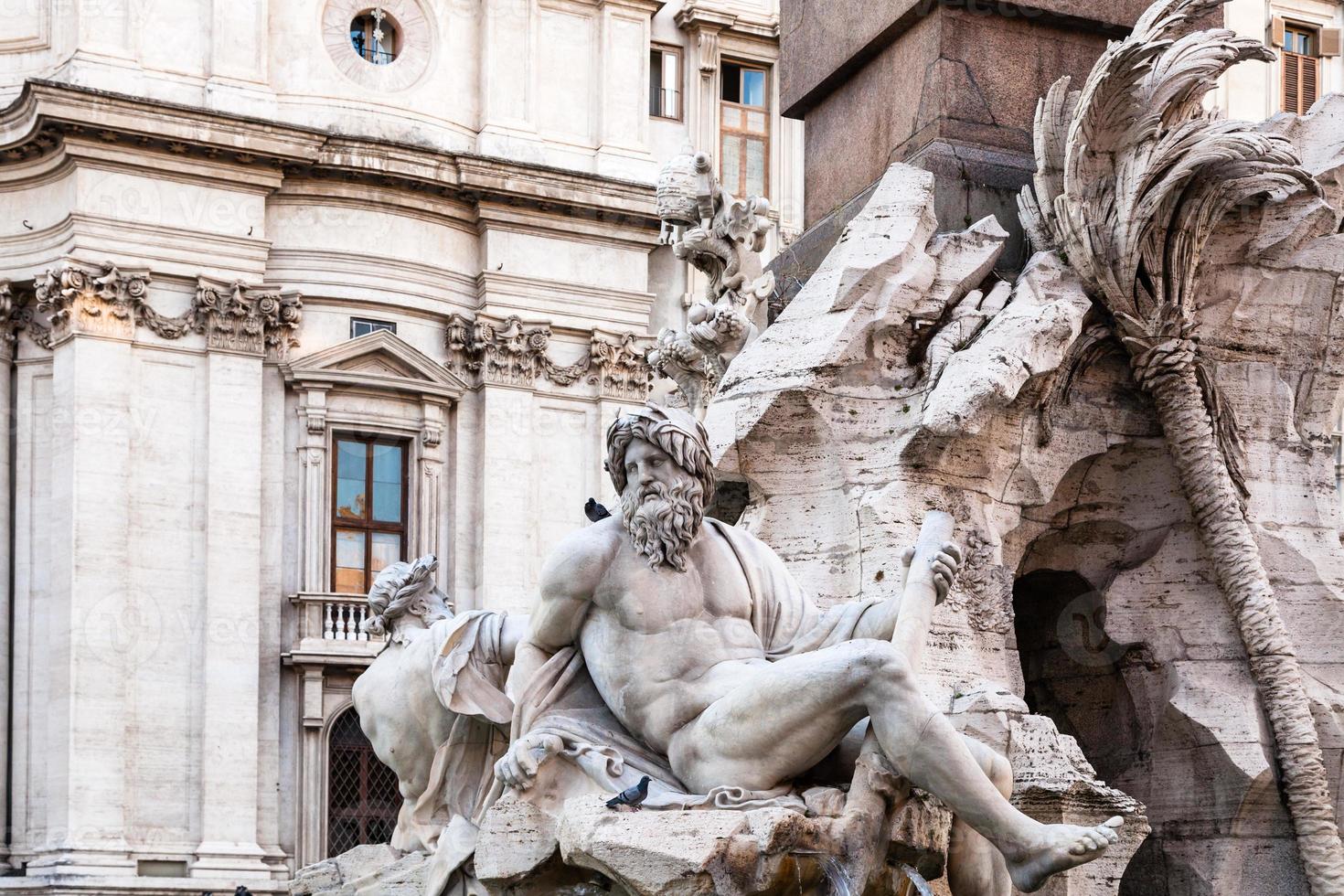 statues of Fontana dei Quattro Fiumi in Rome photo