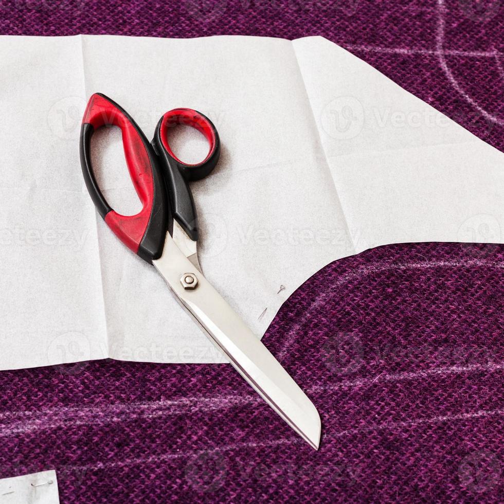 tailor shear on paper pattern cutting form photo