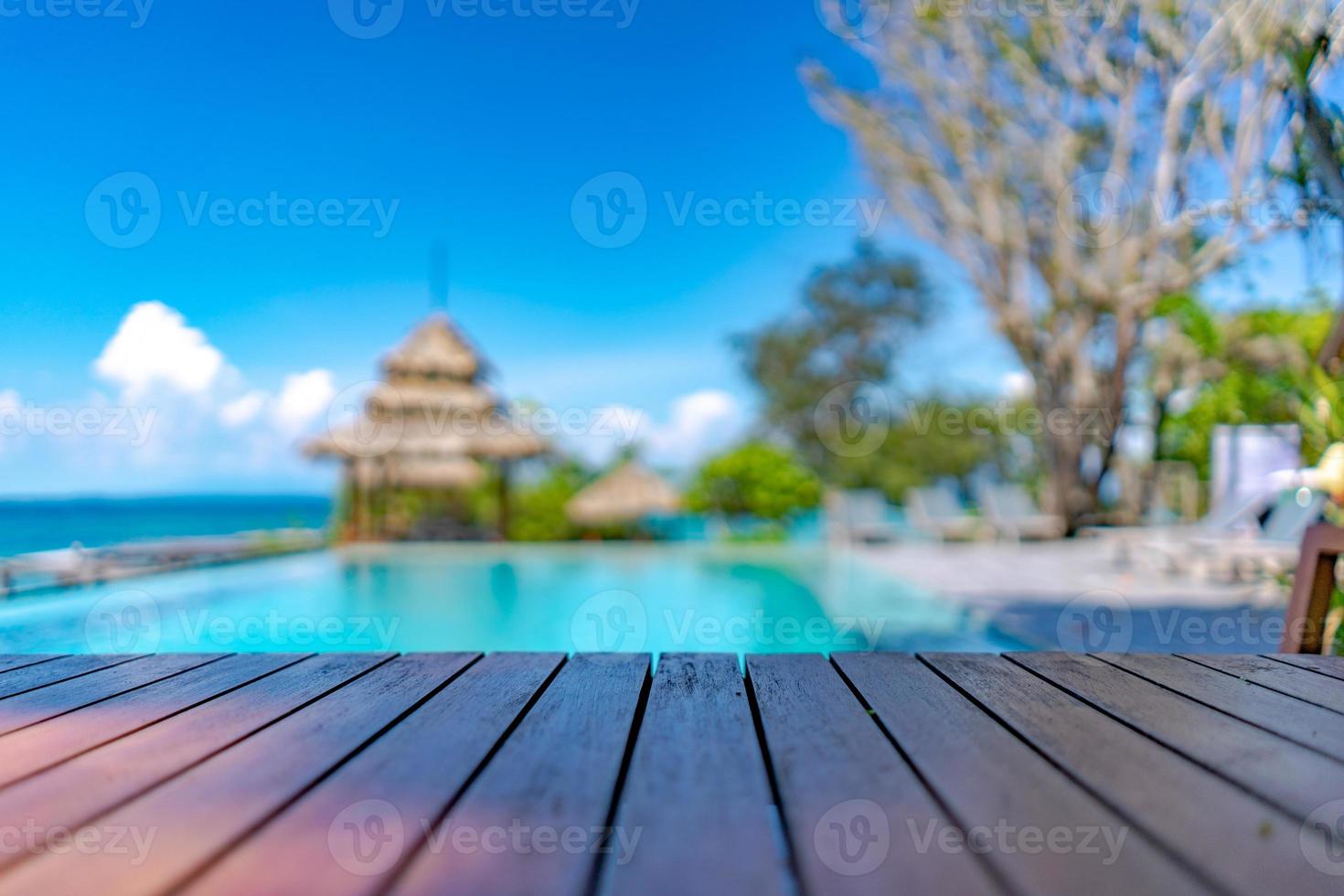Wood Vintage Terrace on the beach with blue Sea, Ocean, Sky Background photo