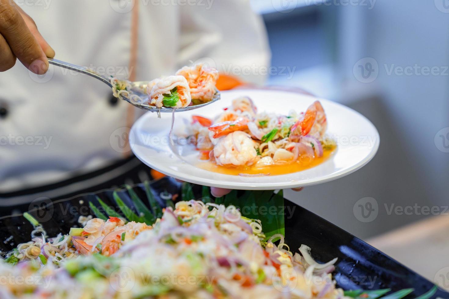 Traditional Thai spicy Noodle vermicelli with seafood shrimp squid and
