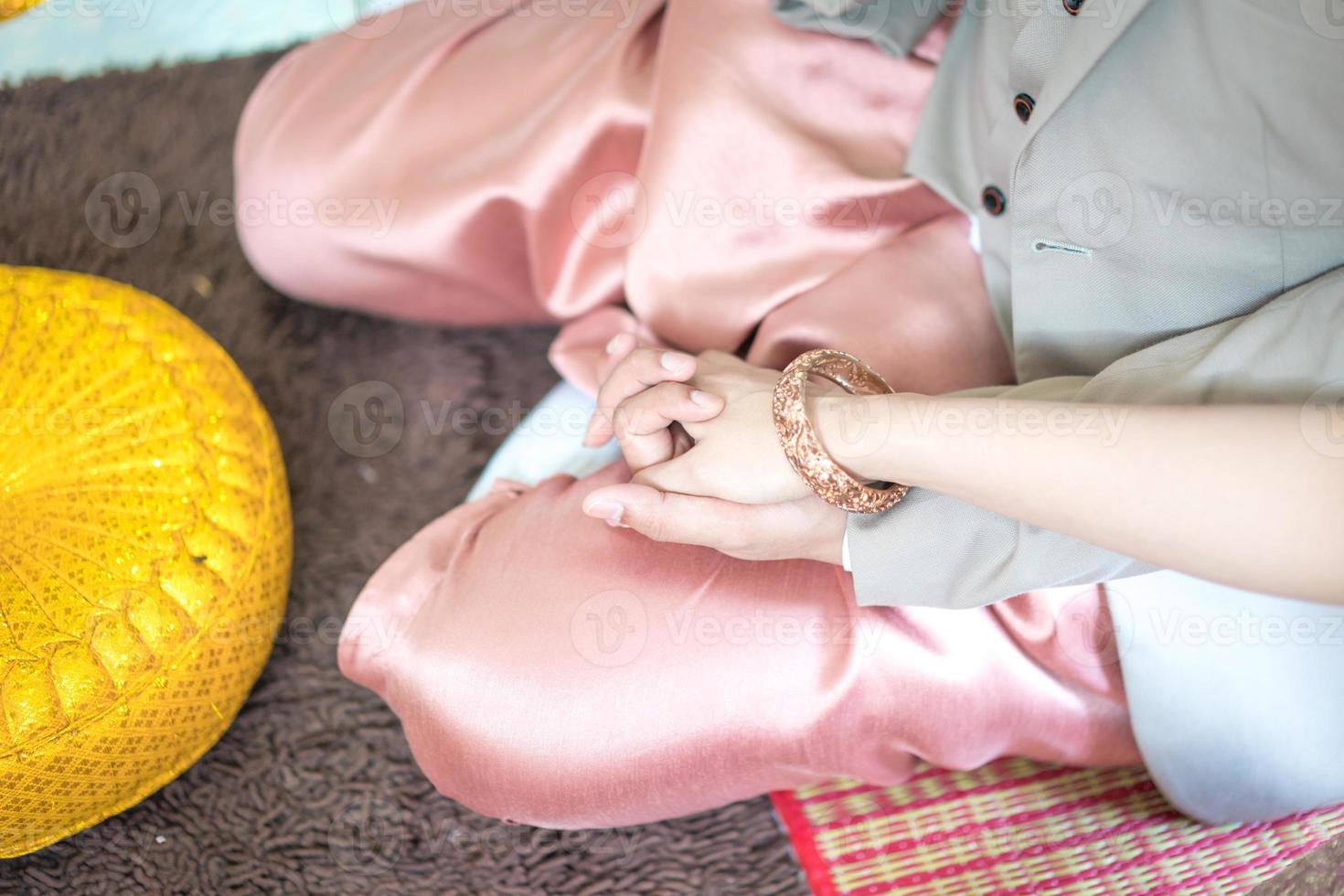 Traditional Thai wedding ceremony in local luxury vintage costume and wedding equipment. photo