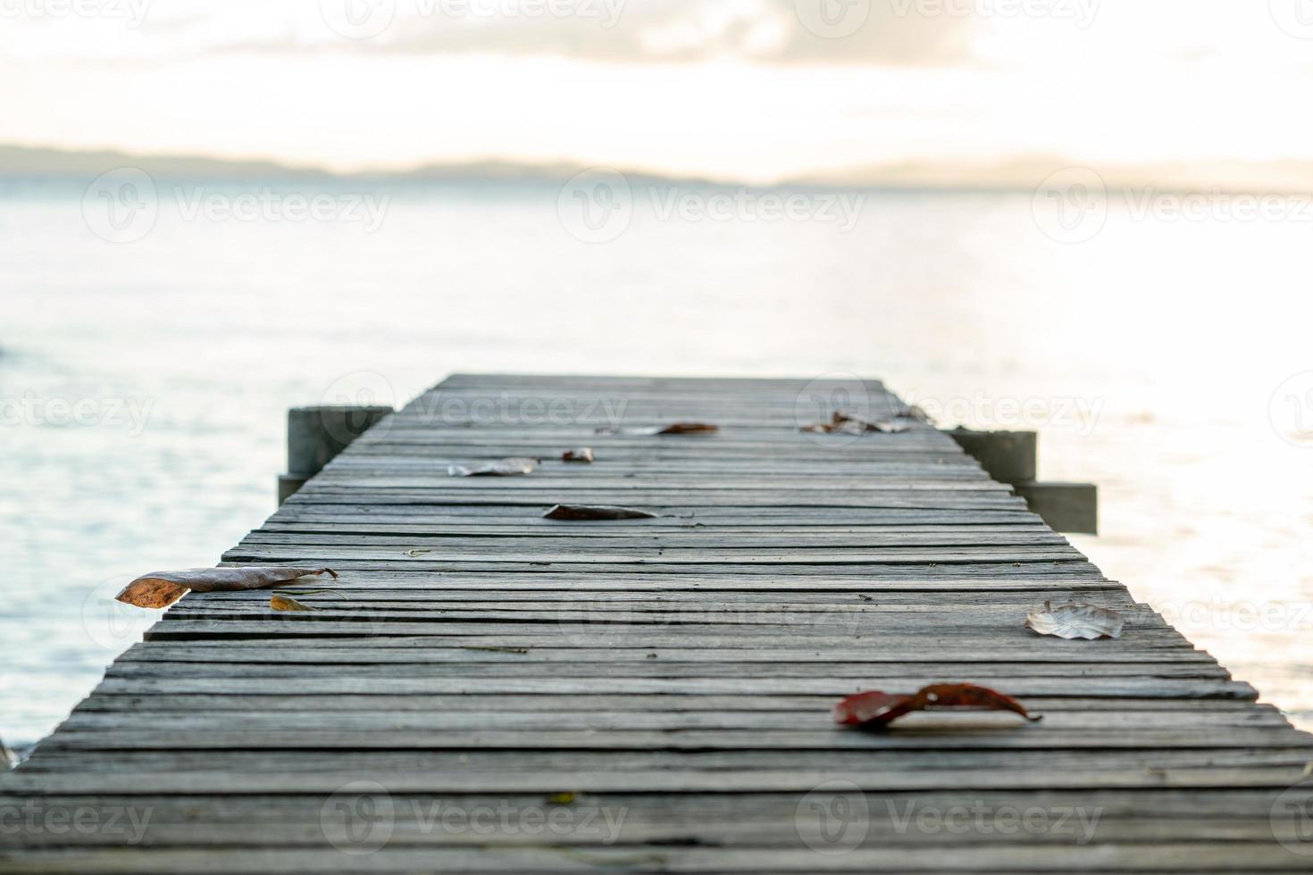 Wood Vintage Terrace on the beach with blue Sea, Ocean, Sky Background photo