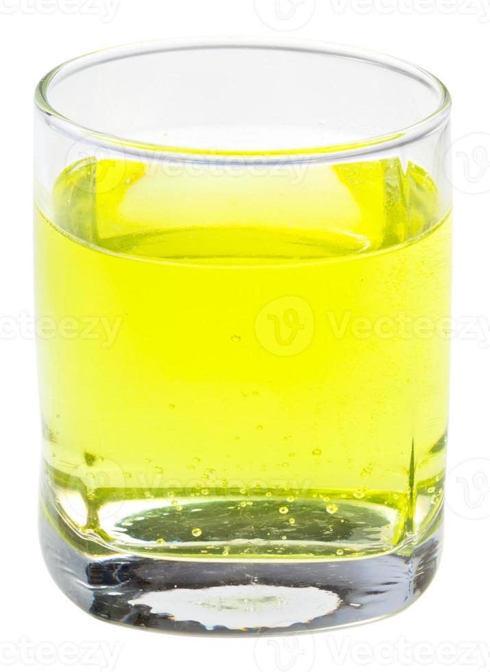 glass of yellow carbonated water with vitamin C photo