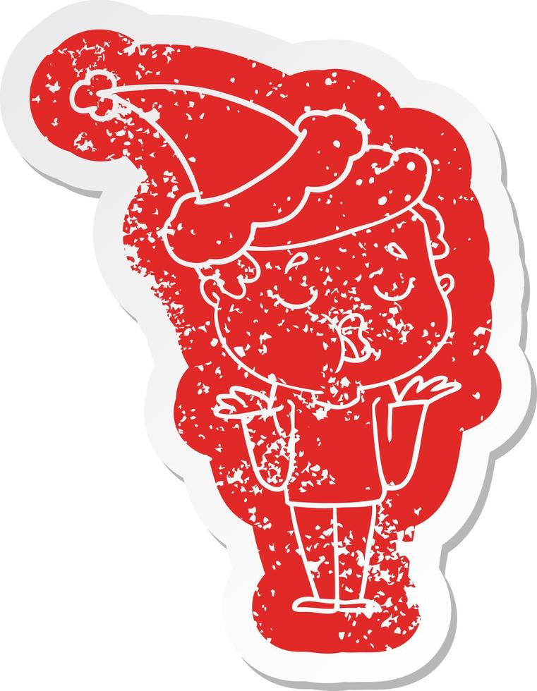 cartoon distressed sticker of a man talking and shrugging shoulders wearing santa hat vector