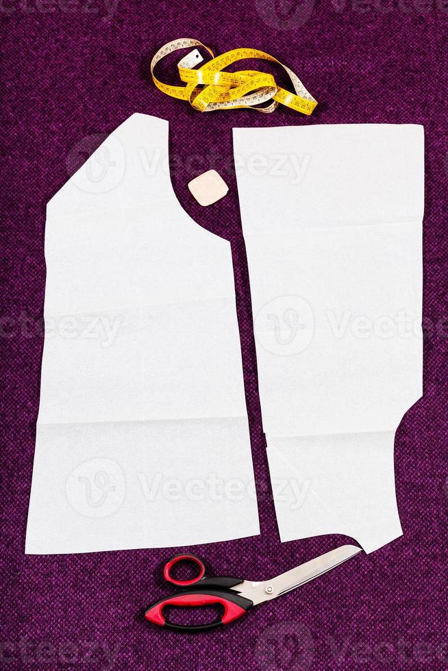 tailor tools and pattern cutting of clothes photo
