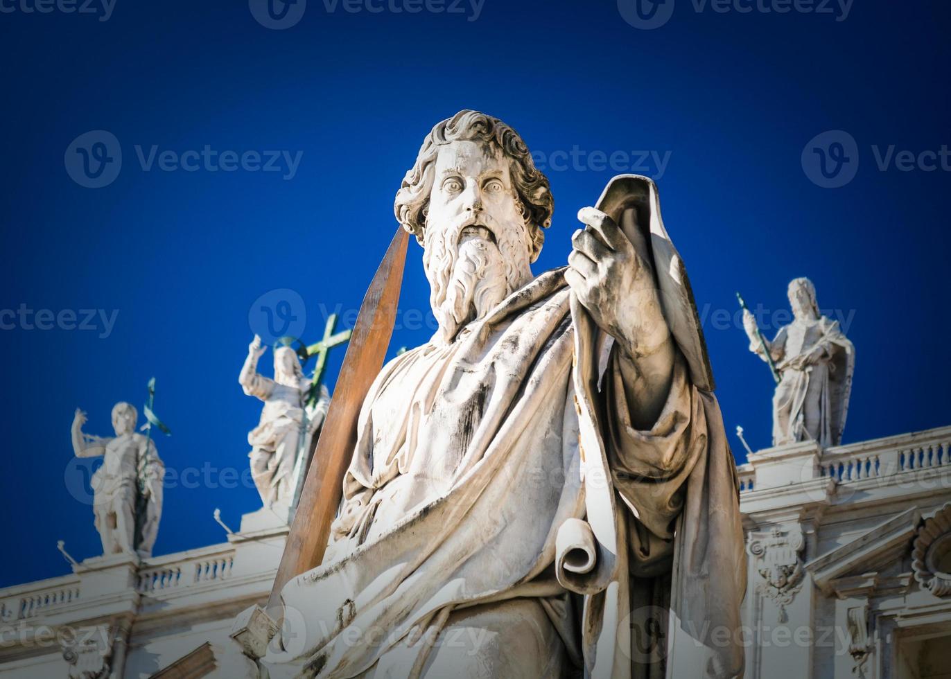 Statue of Apostle Paul near St Peter Basilica photo