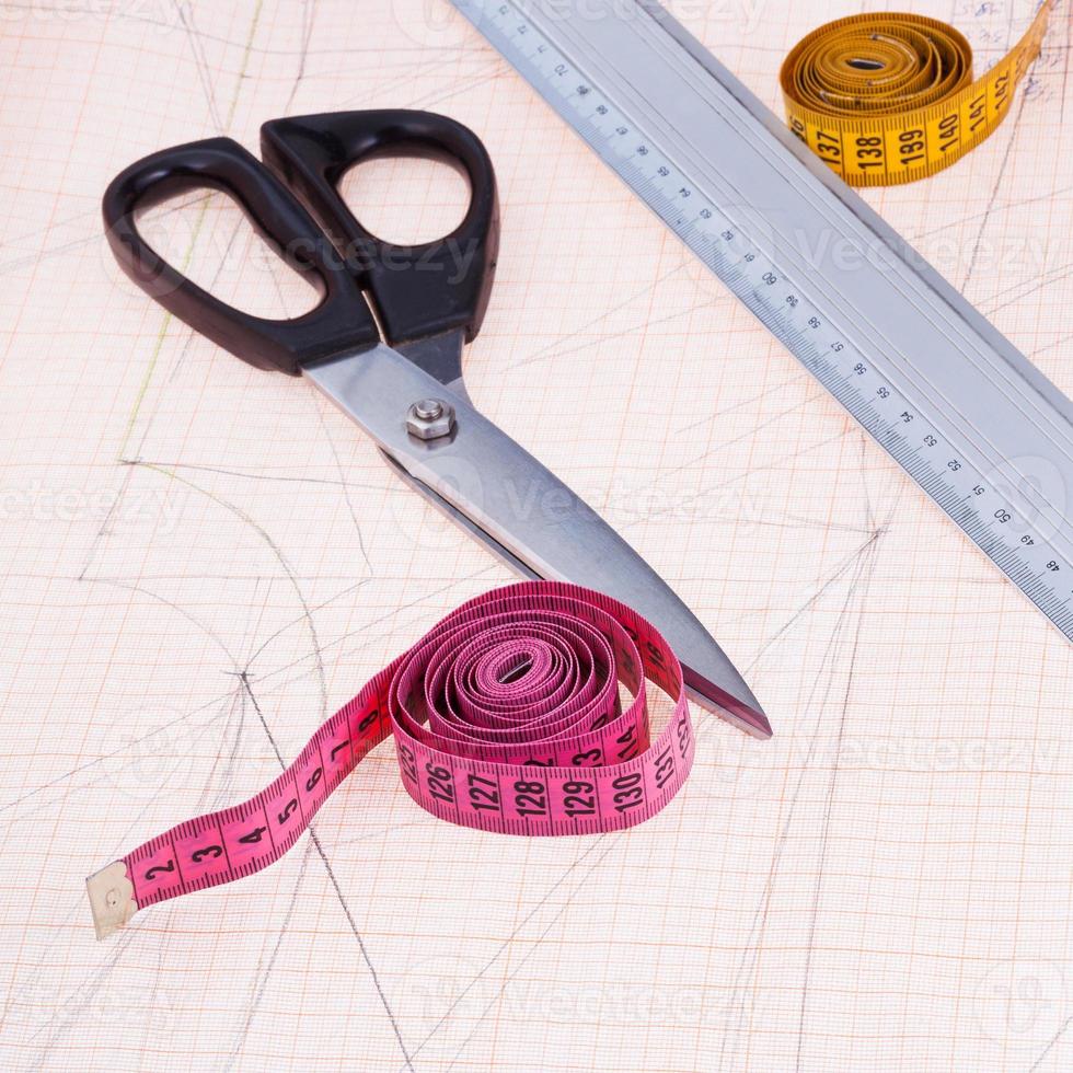 dress pattern at graph paper and fitter instruments photo