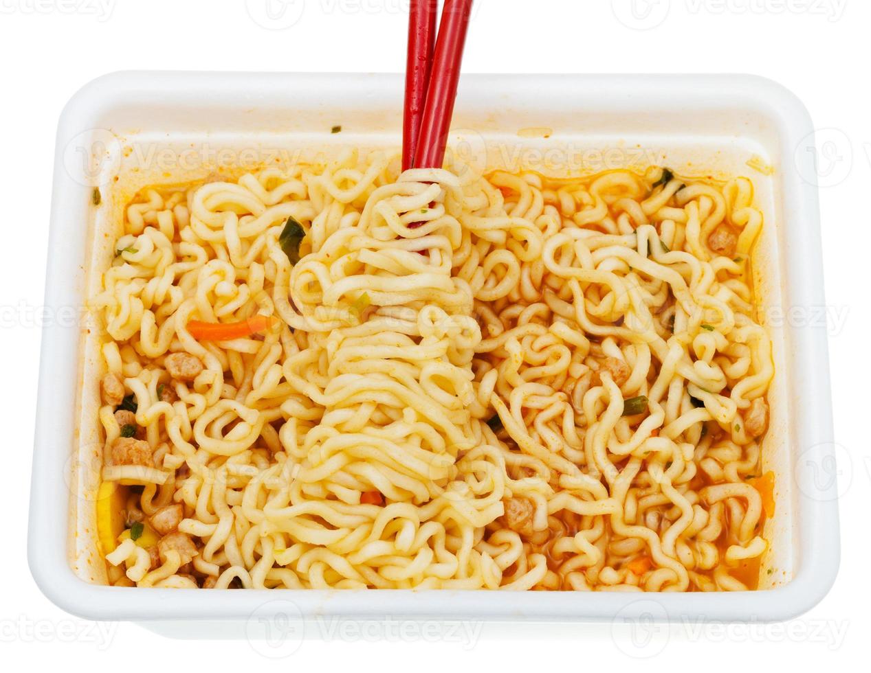 eating of instant ramen from lunch box photo
