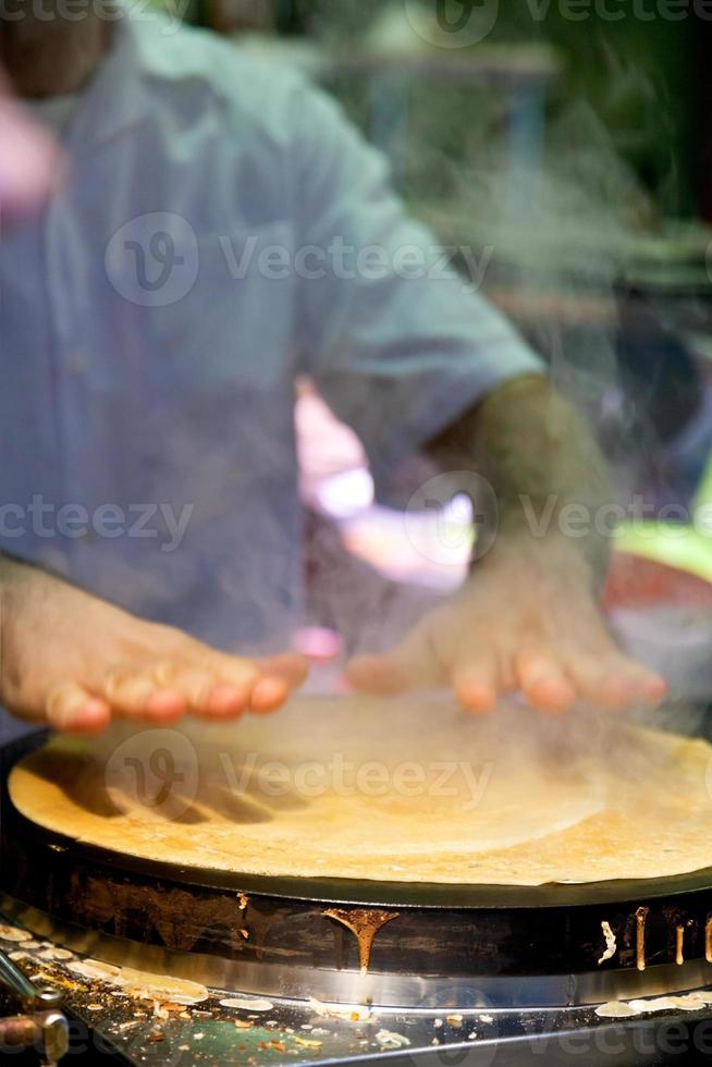 cooking crepe close up photo