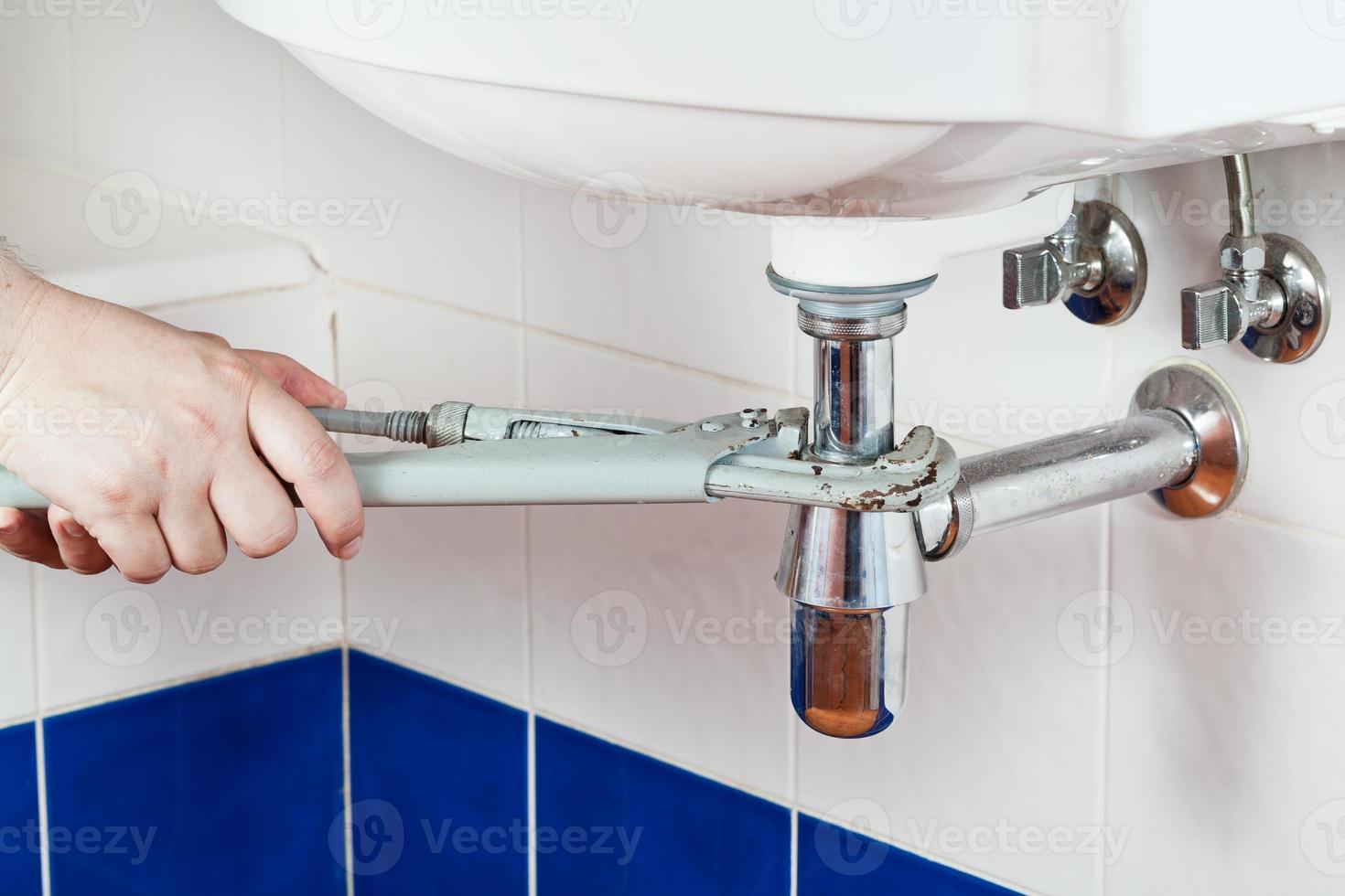repairing sink drain photo
