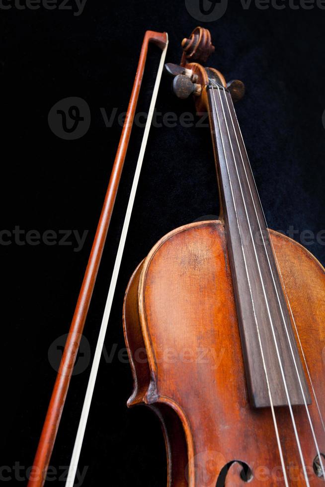 violin and bow on black background photo