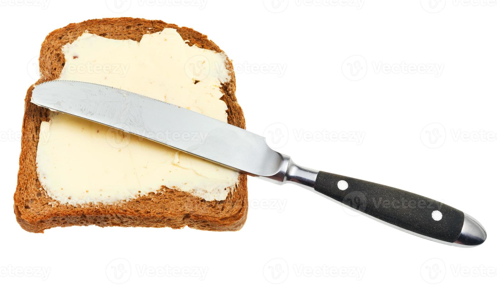 bread and butter sandwich with table knife photo