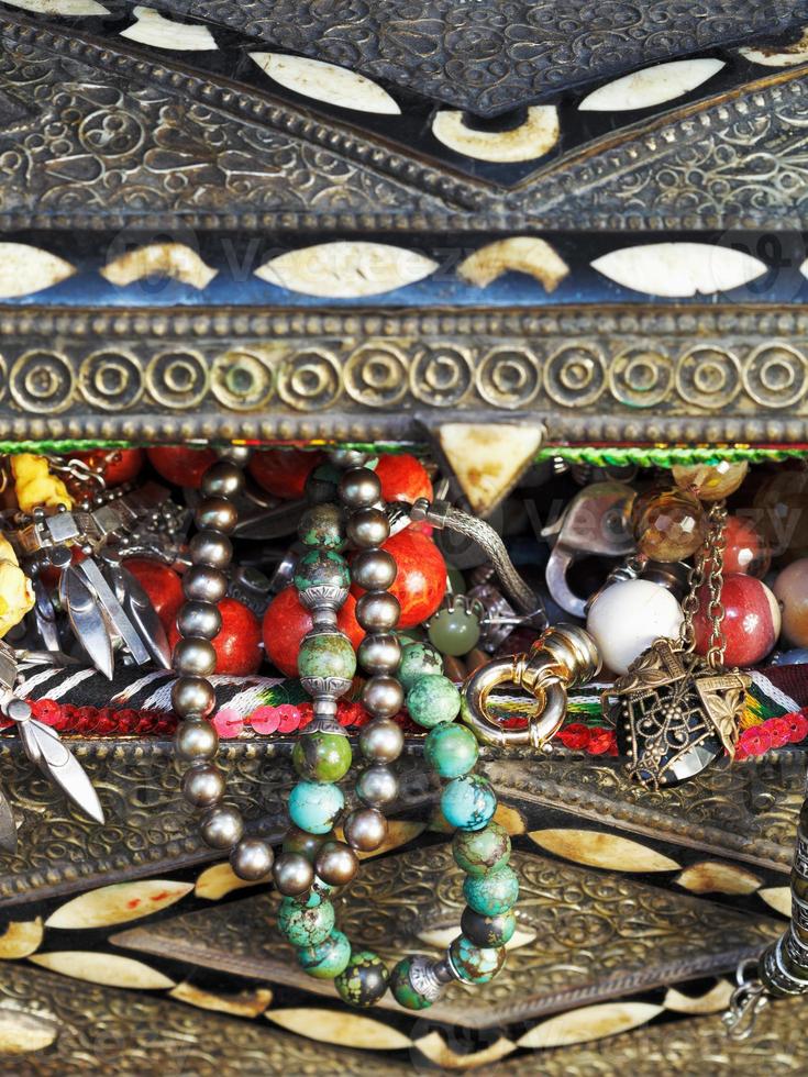 antique jewelry in ancient treasure chest photo