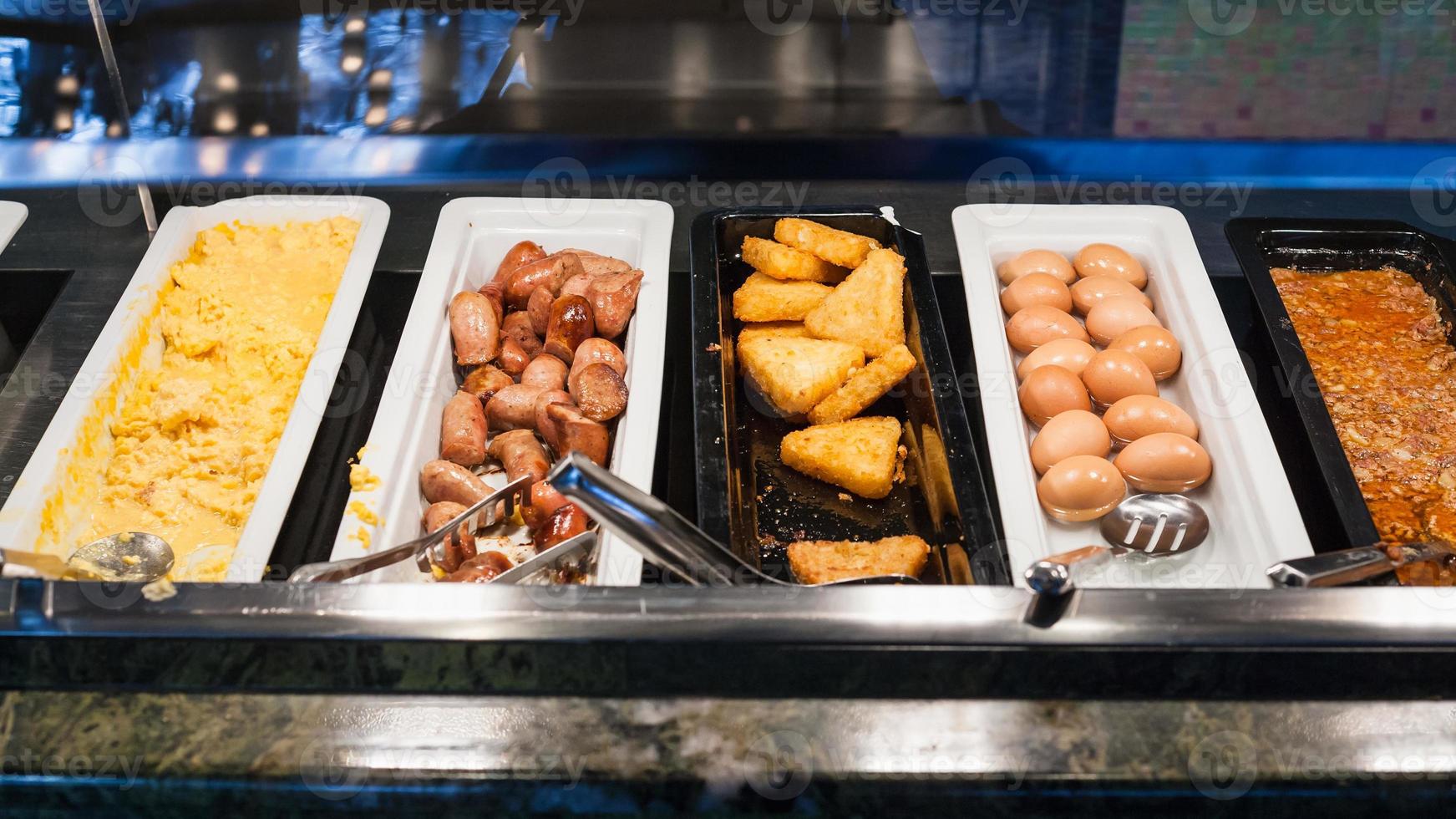 self-service buffet with meals for breakfast photo