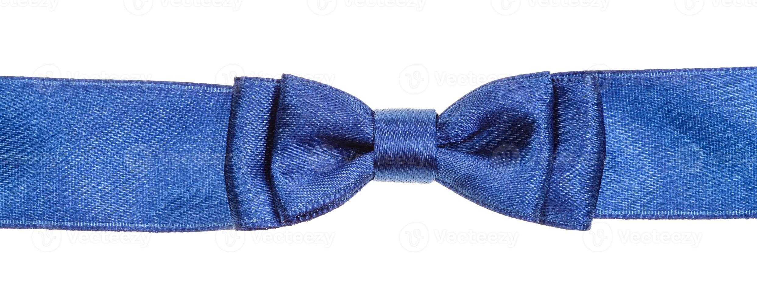 real blue bow knot on wide satin ribbon isolated photo