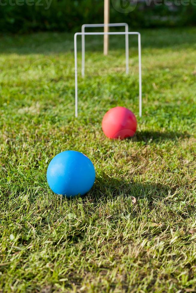 juego de croquet en césped verde foto