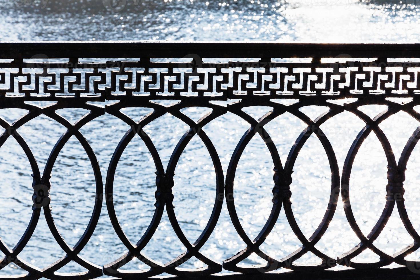 metal parapet on waterfront photo