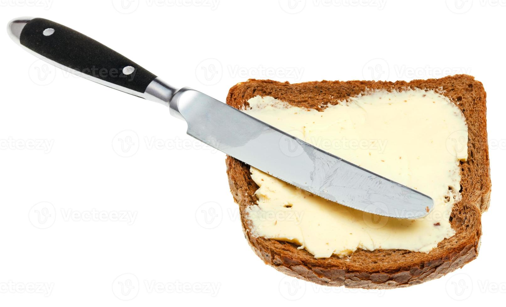 bread and butter sandwich with table knife photo